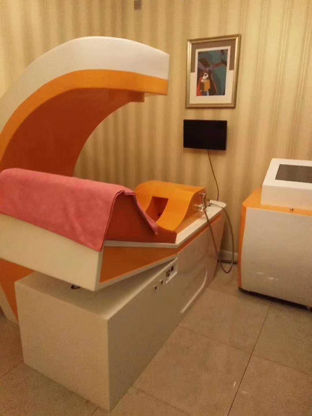 Modern colon hydrotherapy clinic with professional equipment setup