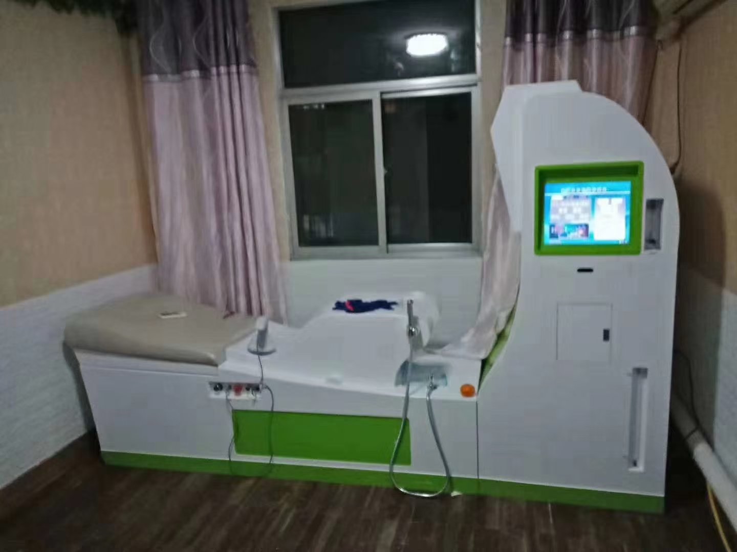 Person researching colon health information on laptop with medical charts visible