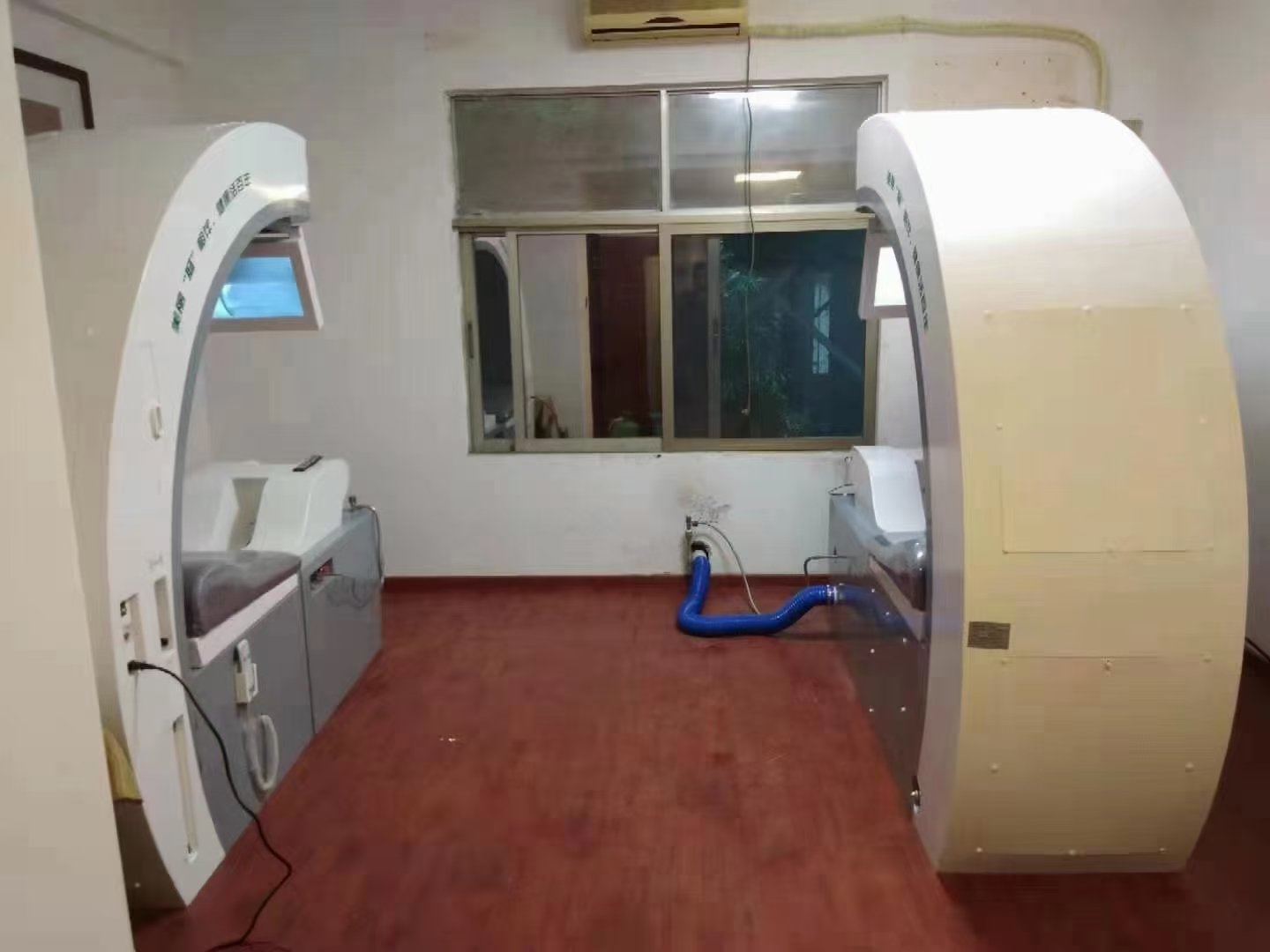 Licensed colon hydrotherapist conducting safe treatment session with modern equipment