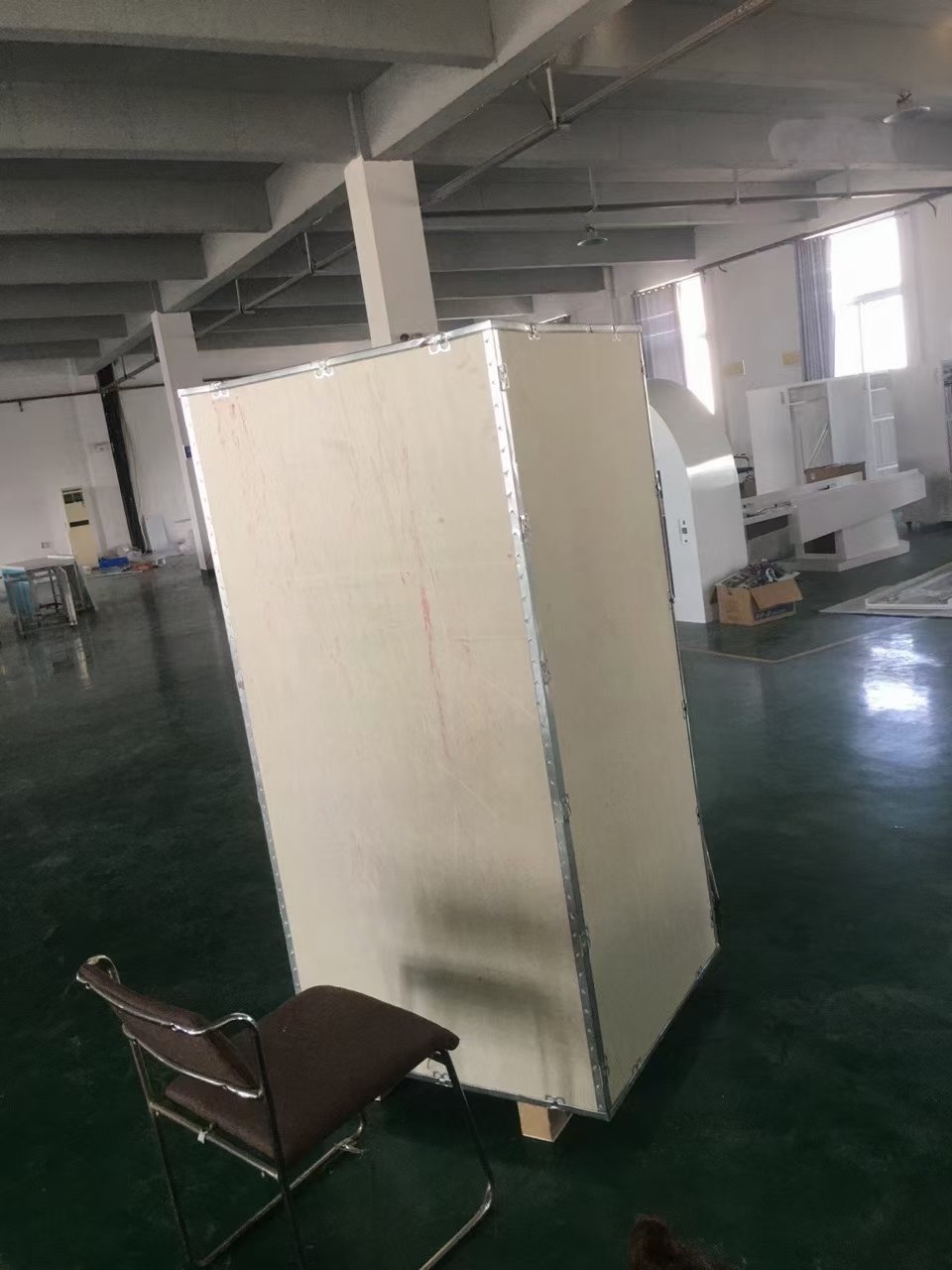 Secure wooden crate packaging for international colonic machine shipment