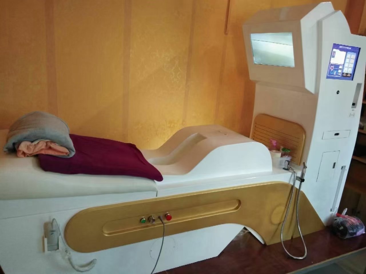 Professional colon cleanse therapy room with modern equipment
