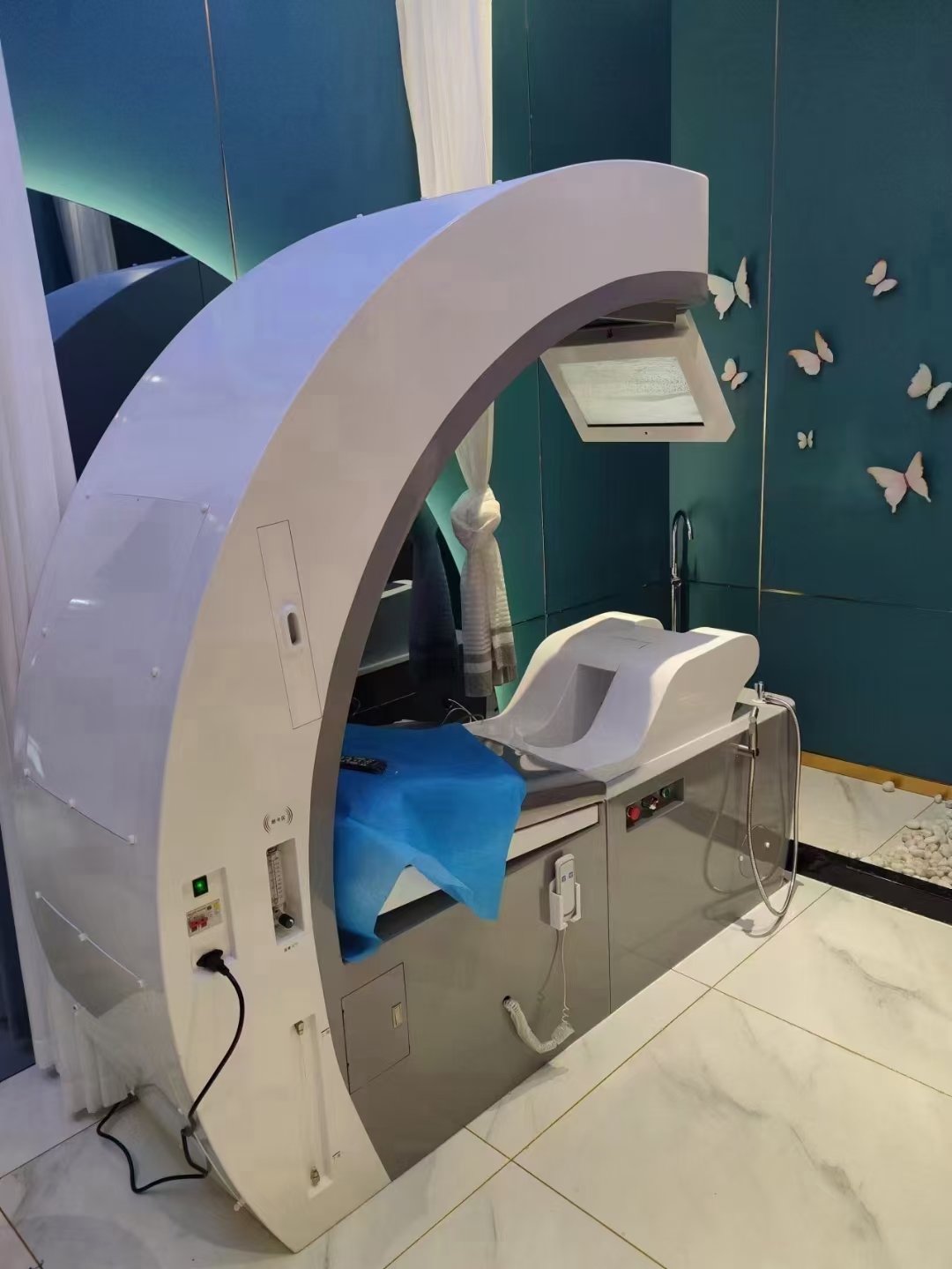 hydro san colonic machine professional setup in modern wellness center